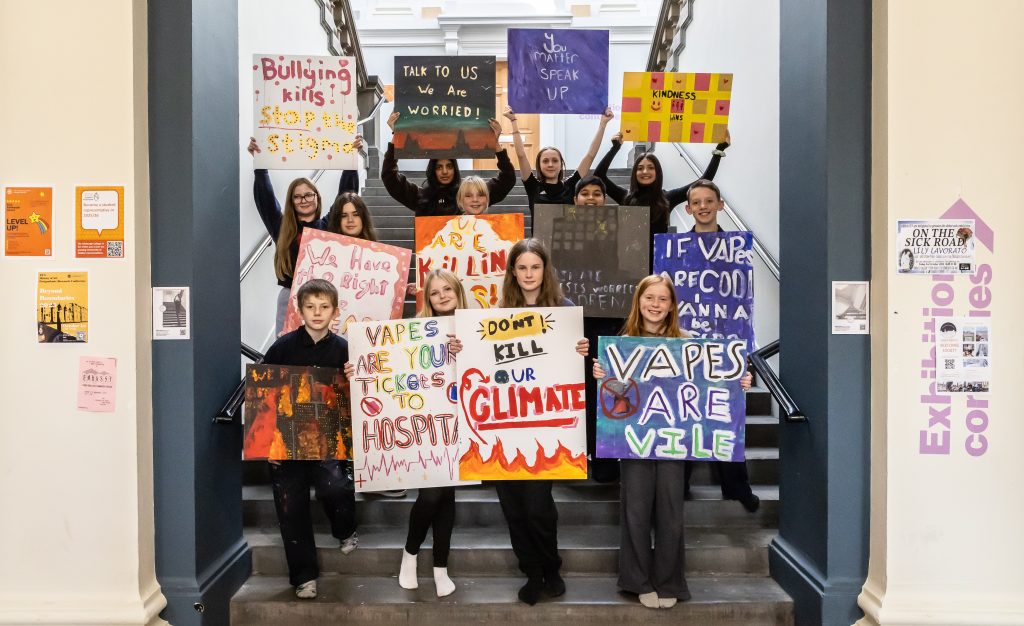 Child Human Rights Defenders at Edinburgh College of Art following their residential weekend creating placards for Talbot Rice Gallery with Bob and Roberta Smith.