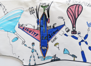 A child's drawing of a Dignity in School aeroplane. The plane is blue, with Dignity in School written across its wings. There is a hot air balloon next to the plane, and children run around underneath it.