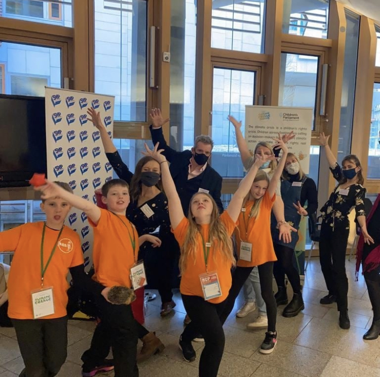 Members of Children's Parliament celebrate after sharing their views with the Scottish Parliament