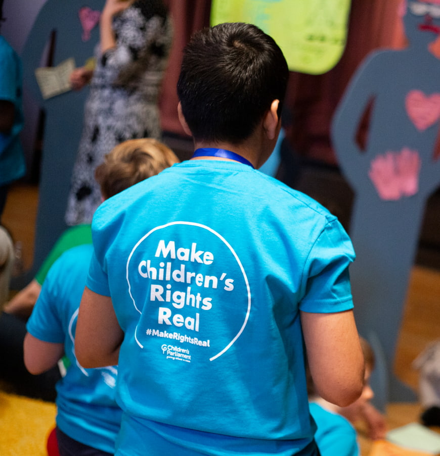 Person with blue t-shirt taking part in session